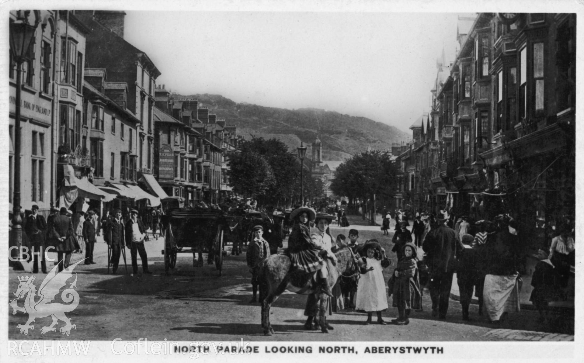 Digital copy of postcard showing North Parade, Aberystwyth, looking North, dated early 20th c. (publisher: J & J Gibson).  Loaned for copying by Charlie Downes