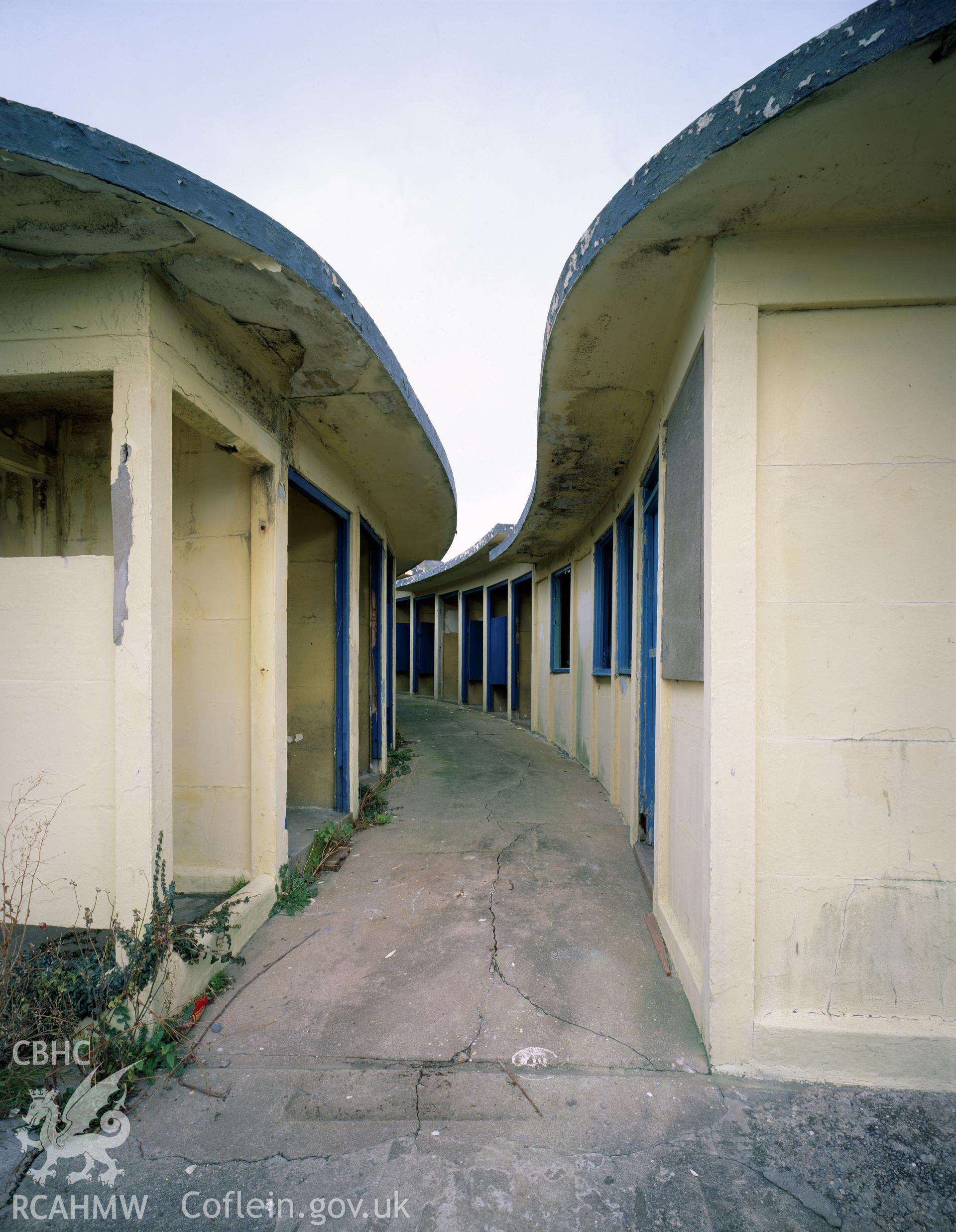 RCAHMW colour transparency showing view of the passageway between the changing cubicles at Cold Knap Lido, Barry.