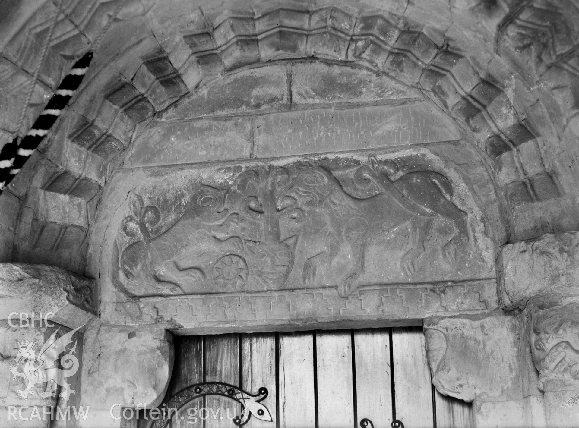 View of stone carving above the door entrance to Llanbadarn Fawr Church, Radnorshore taken by W A Call circa 1937.