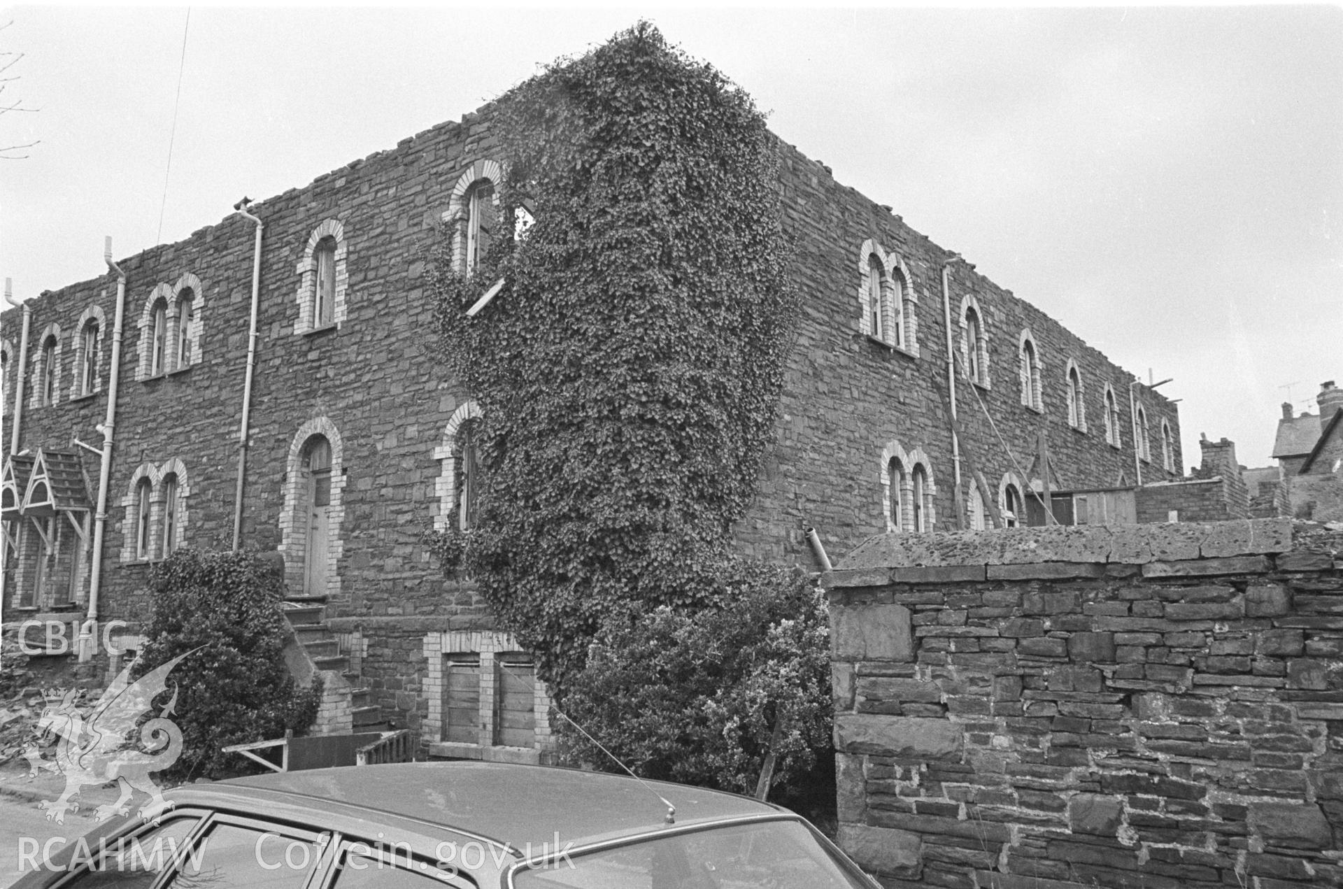 Photo showing Gogerddan Barracks, Aberystwyth, during demolition in 1980.