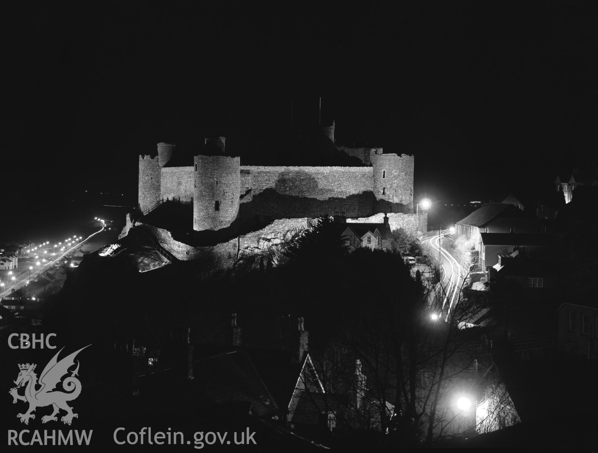 Photographic negative showing view of Harlech Castle at night; collated by the former Central Office of Information.