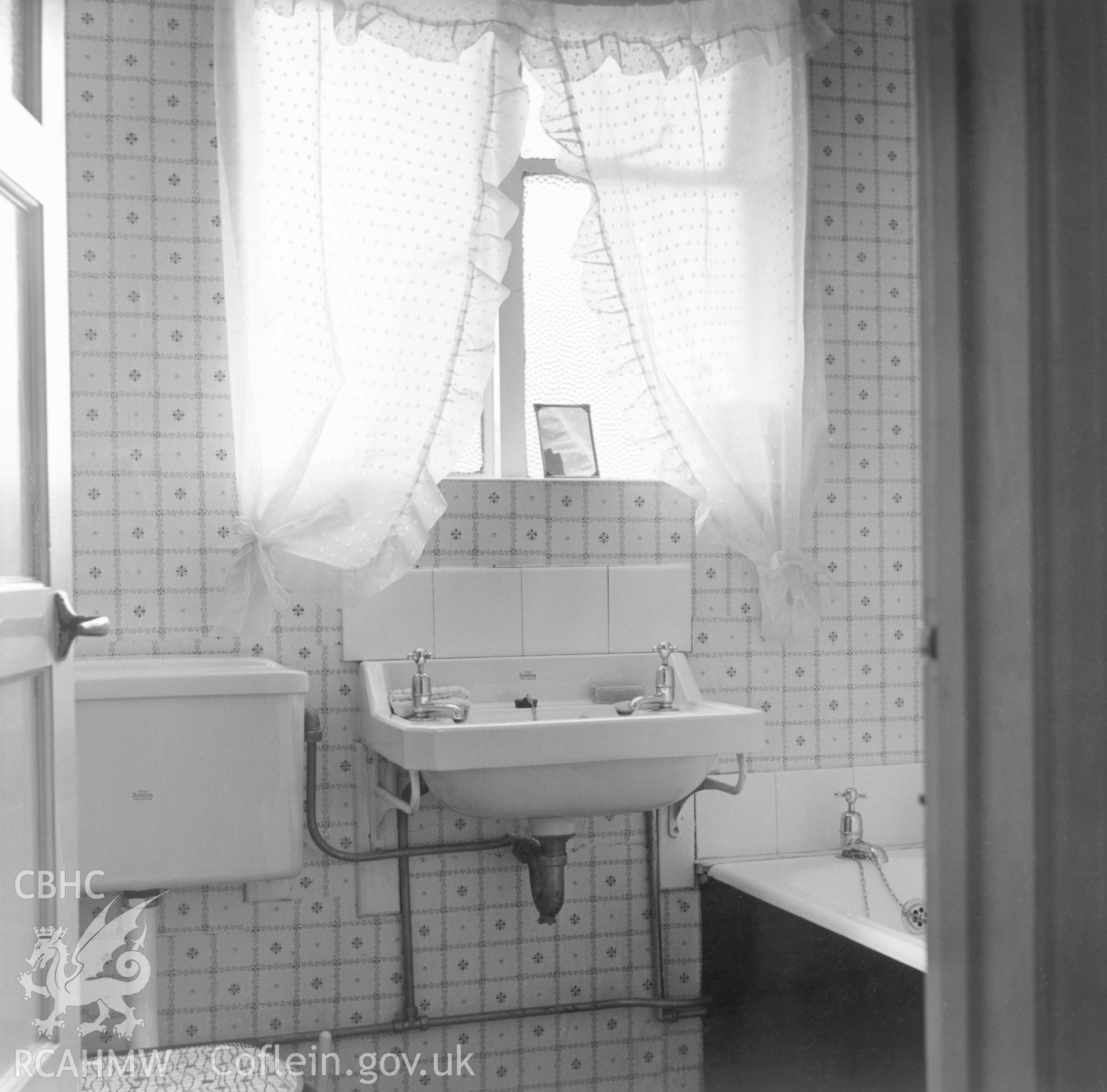 1 b/w print showing interior of a house on Council Street, Ebbw Vale (showing bathroom), used as an illustration of the Housing Improvement Grant scheme for exhibitions held at Ministry of Housing stands at agricultural shows (1960); collated by the former Central Office of Information.