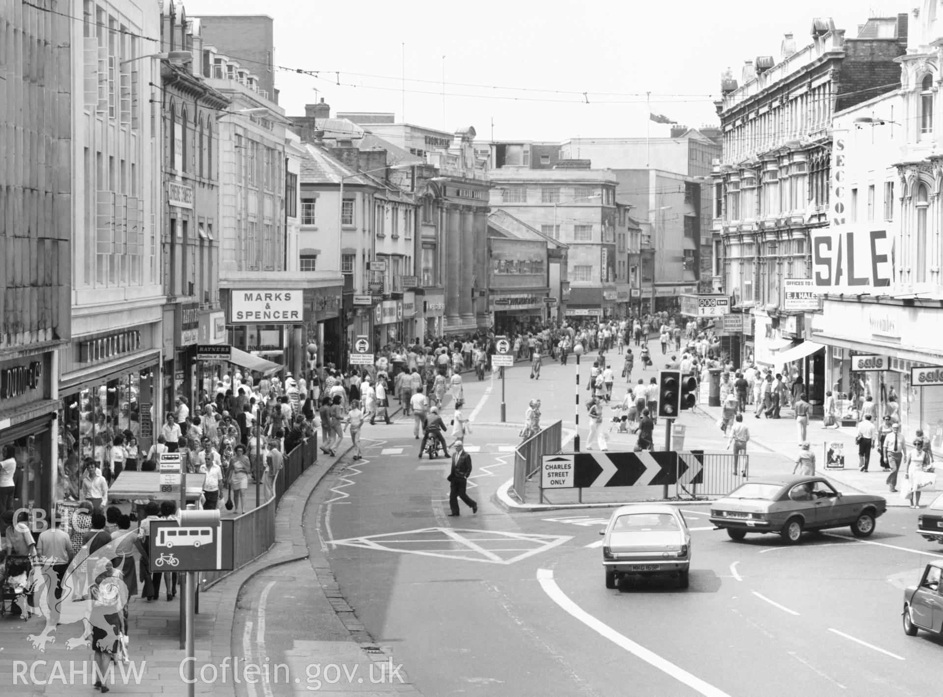 1 b/w print showing Queen Street, Cardiff, collated by the former Central Office of Information.