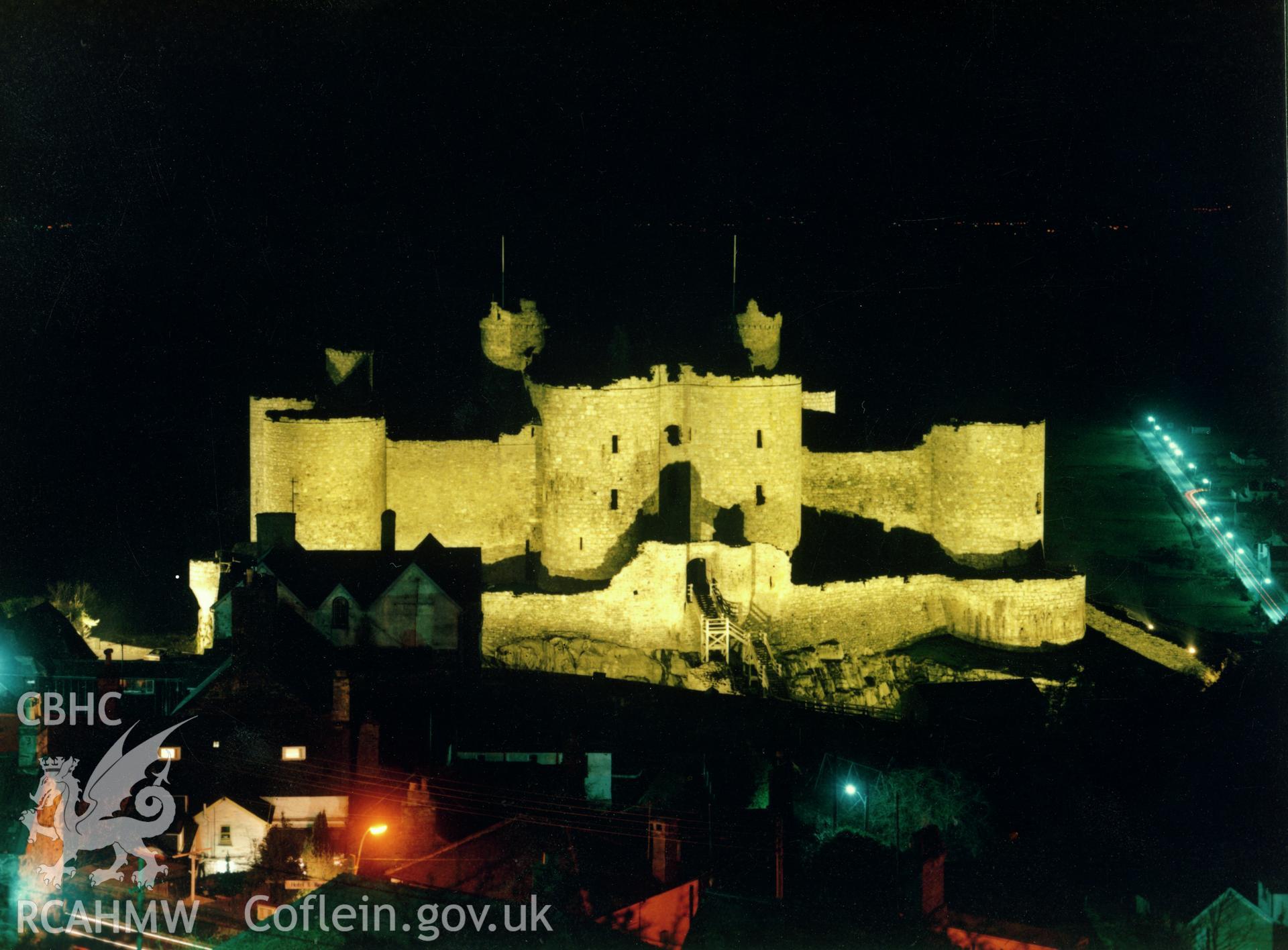 1 of a set of 5 colour prints showing view of Harlech castle at night, collated by the former Central Office of Information.