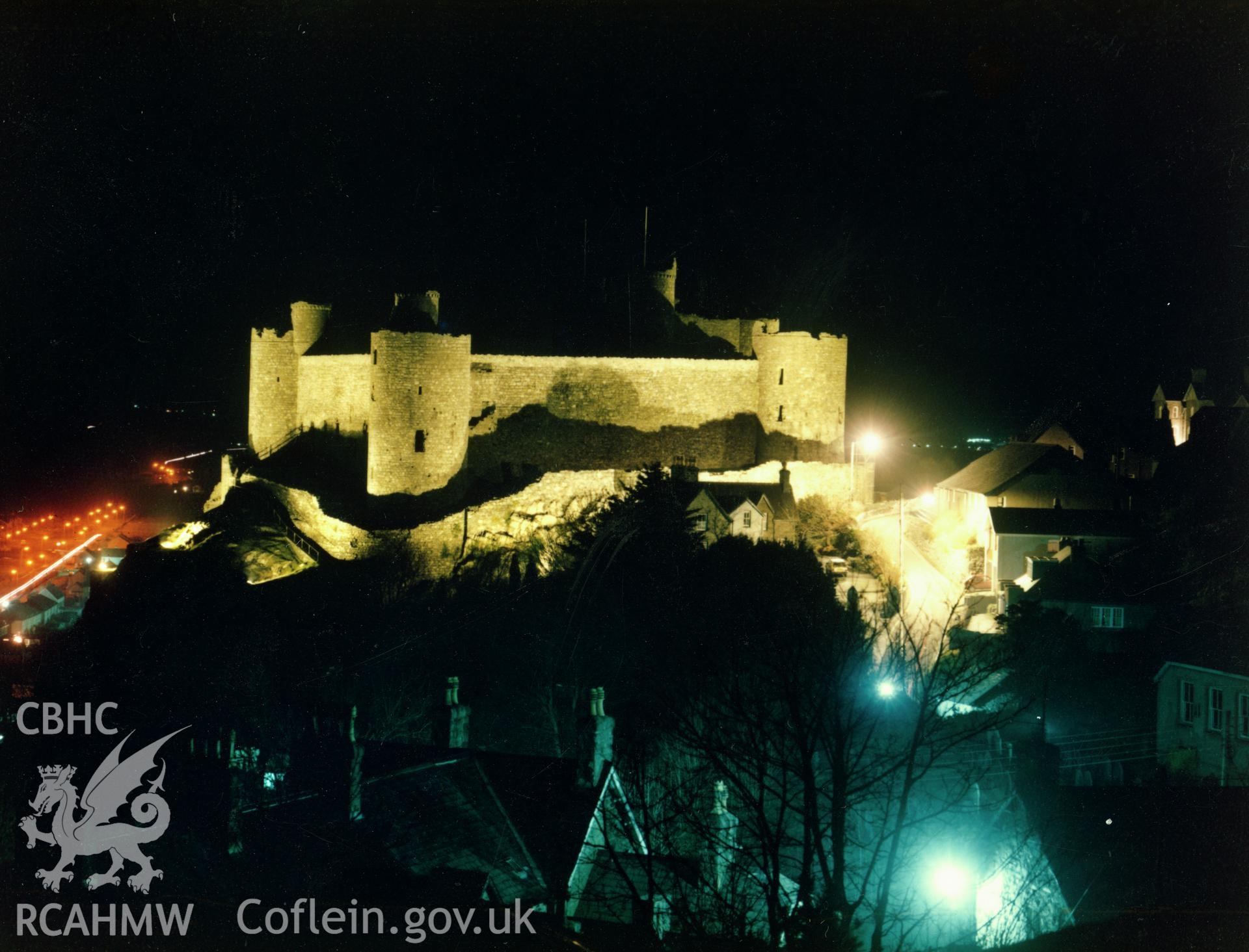 1 of a set of 5 colour prints showing view of Harlech castle at night, collated by the former Central Office of Information.