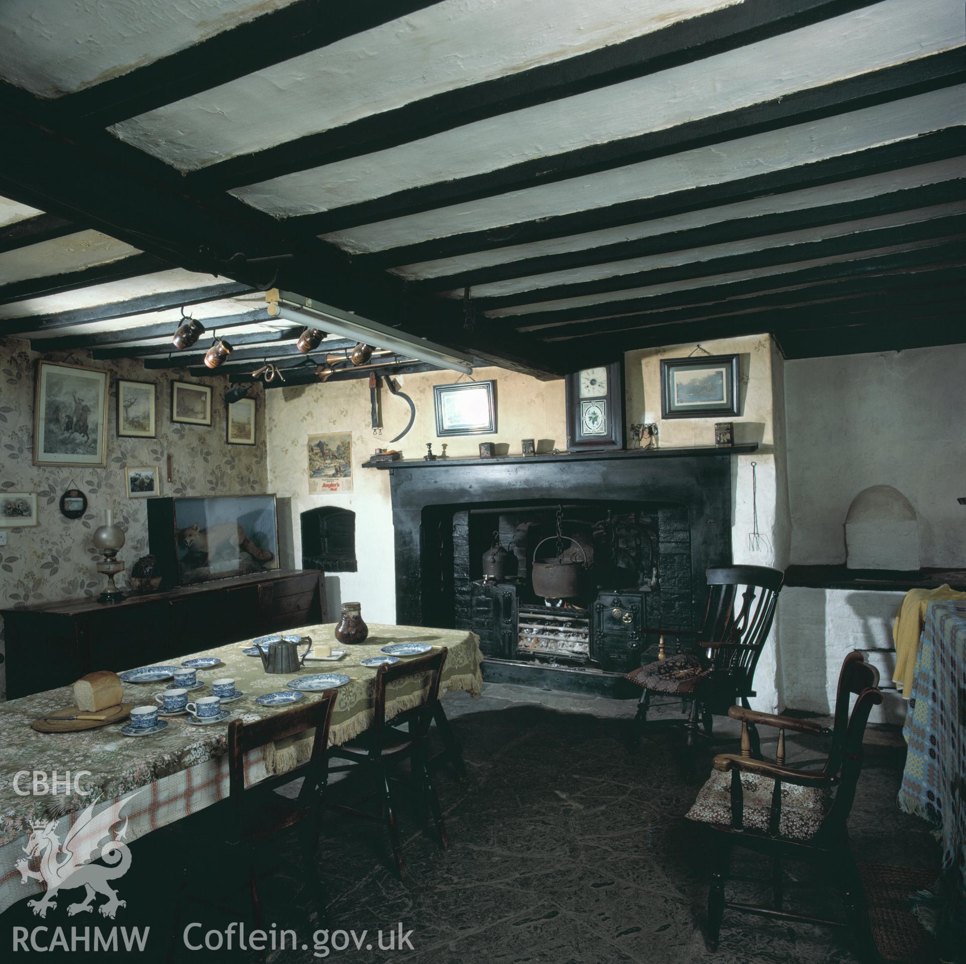 RCAHMW colour transparency showing the fireplace in the kitchen at Glan Ithon Farmhouse, taken by RCAHMW, undated.
