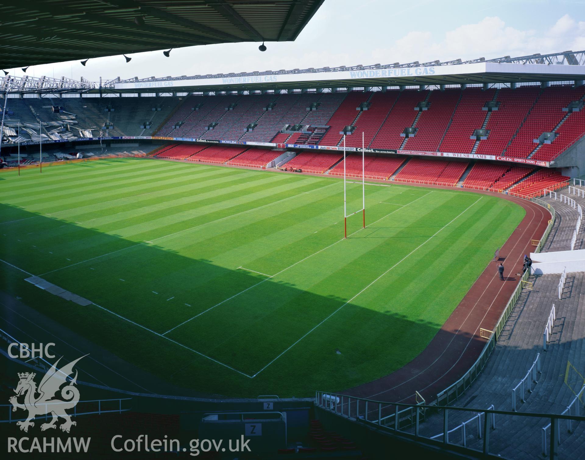 Colour transparency showing a view of the pitch and seating at Cardiff Arms Park, produced by Iain Wright 1997