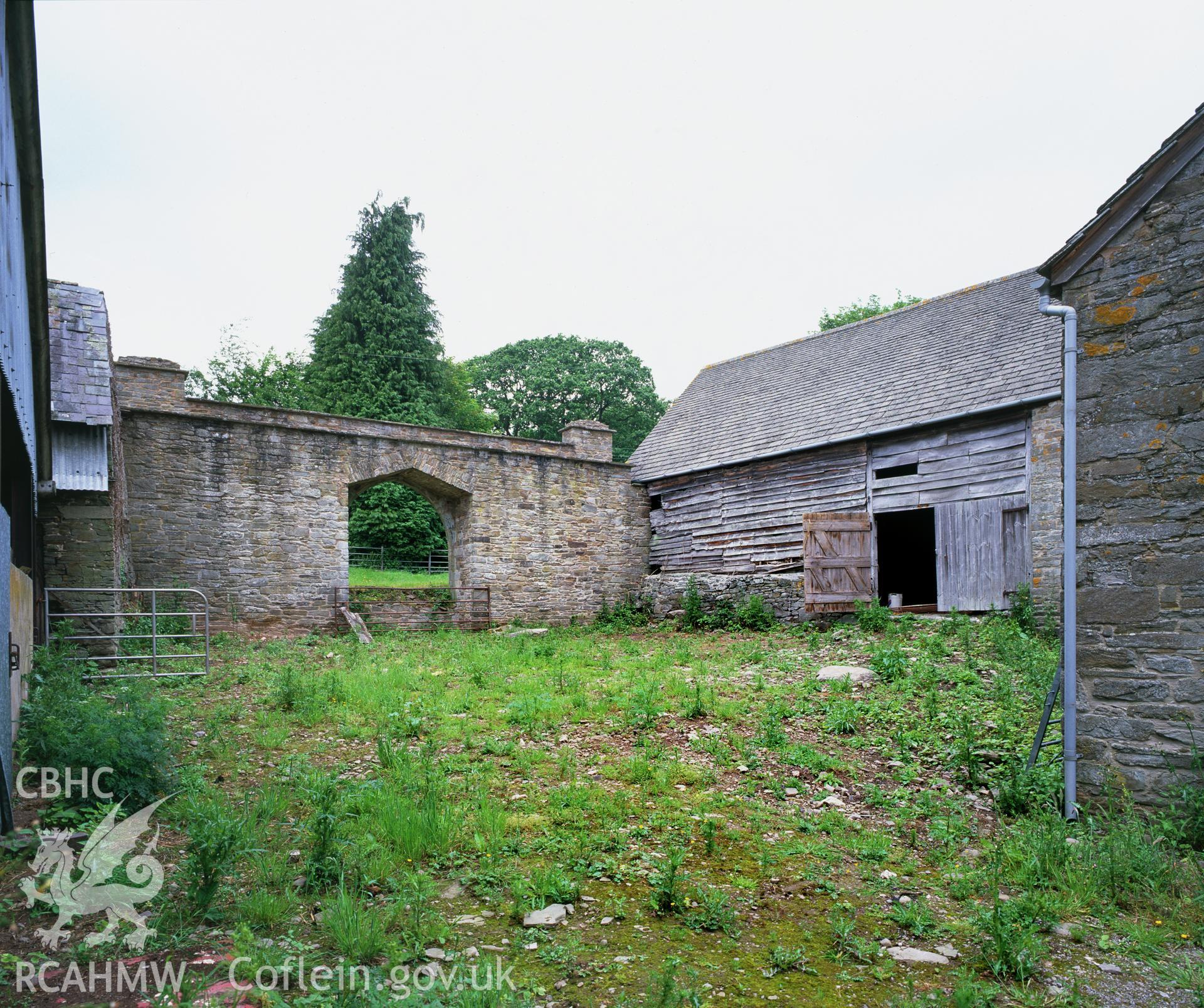 RCAHMW colour transparency showing a general view of the gateway and barn at Clyro Court Farm, taken by Fleur James, August 2003