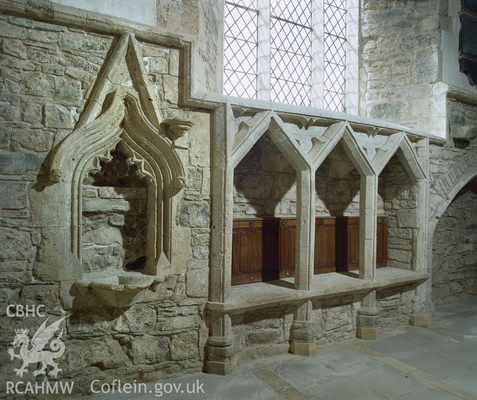 RCAHMW colour transparency showing view of sedilia  in St Mary's Church, Kidwelly.