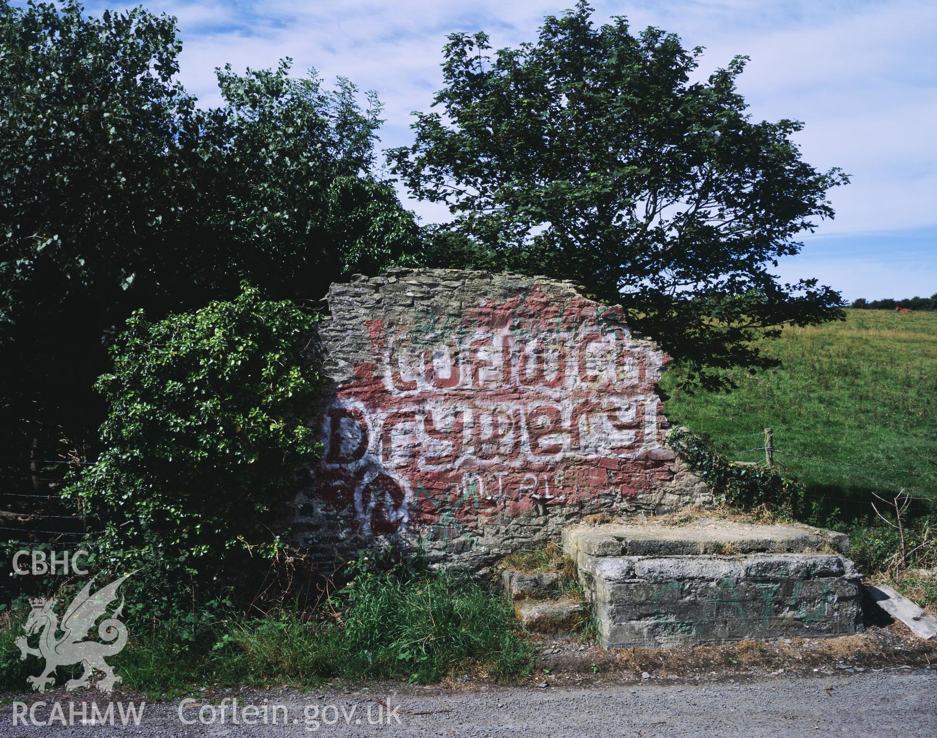 RCAHMW colour transparency showing Cofiwch Dryweryn graffiti at Troed y Rhiw, taken by I.N. Wright, 2002