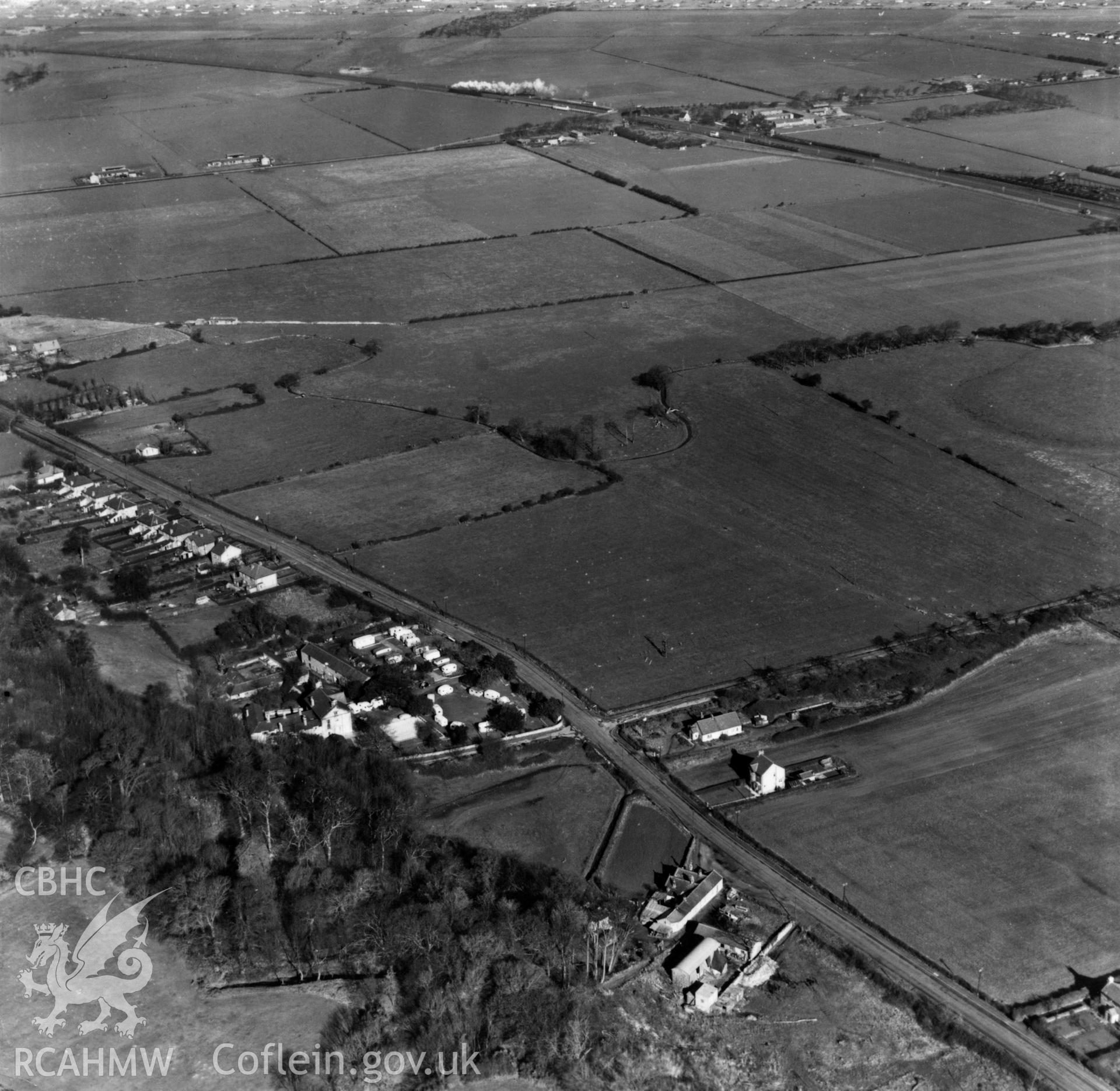 View of Tanlan and the Chester & Holyhead railway. Oblique aerial photograph, 5?" cut roll film.