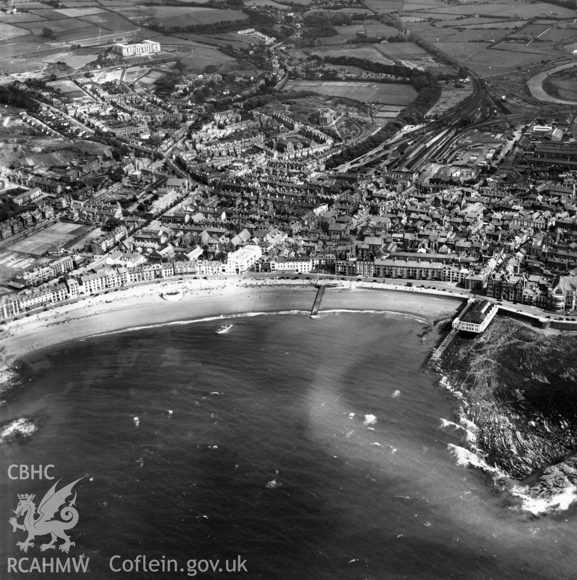 General view of Aberystwyth from the seafront looking east. Oblique aerial photograph, 5?" cut roll film.