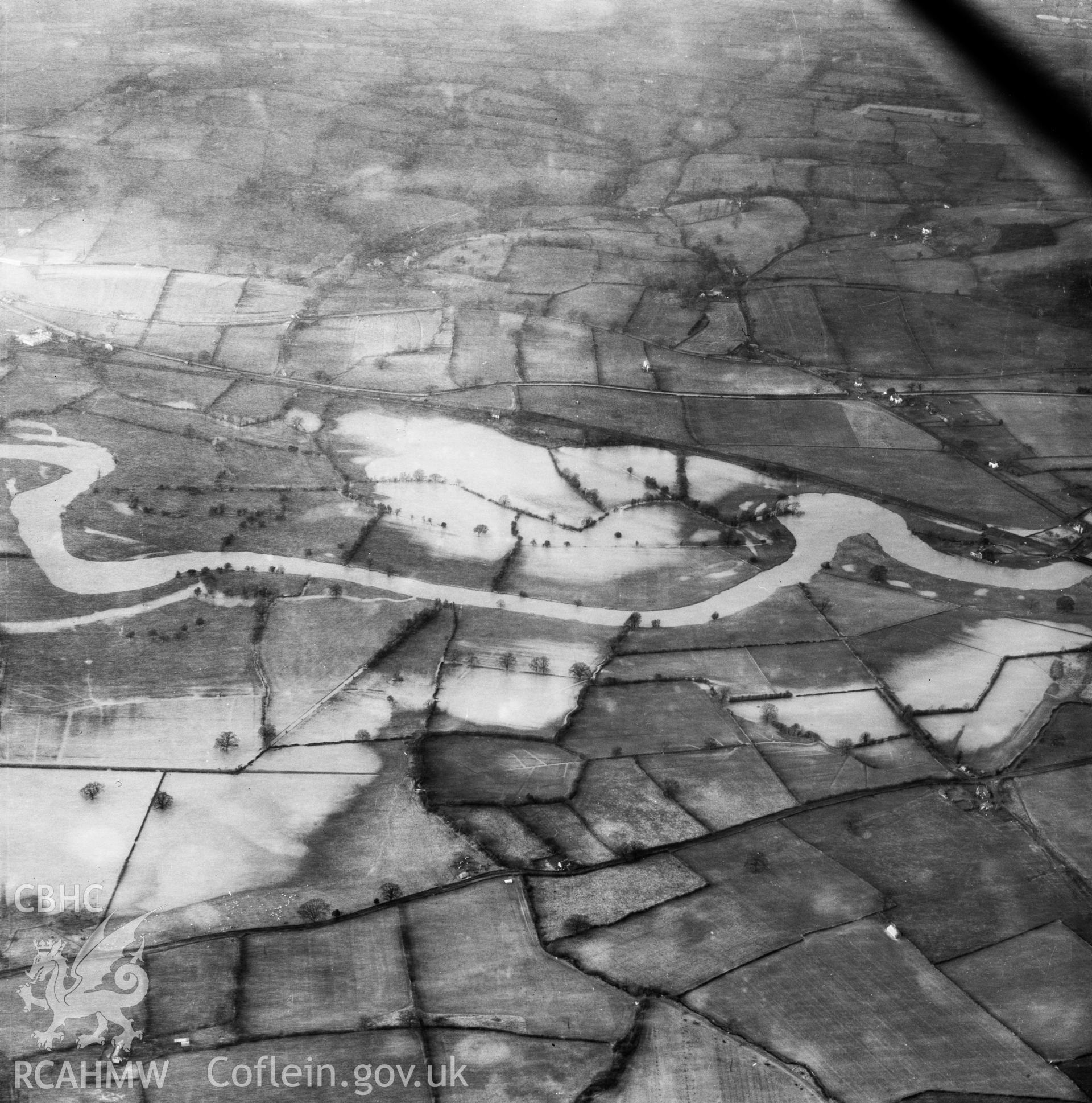 View of the river Severn in flood in the Criggion and Breiddan Hill area. Oblique aerial photograph, 5?" cut roll film.