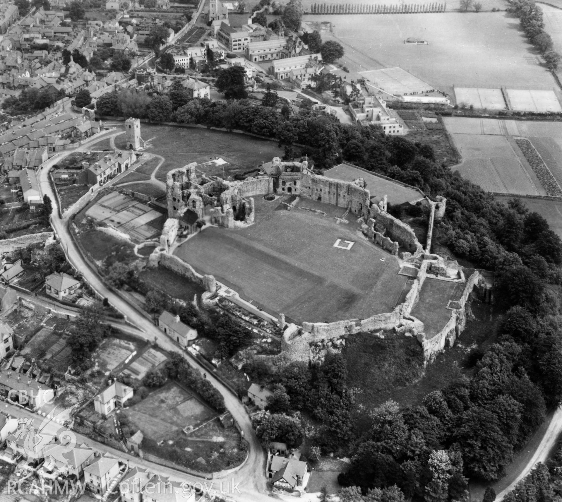 View of Denbigh Upper town showing castle. Oblique aerial photograph, 5?" cut roll film.