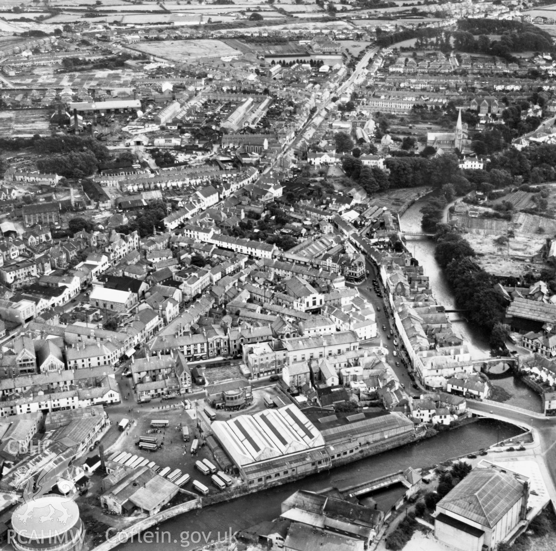 View of Bridgend showing river and bus station (reversed). Oblique aerial photograph, 5?" cut roll film.