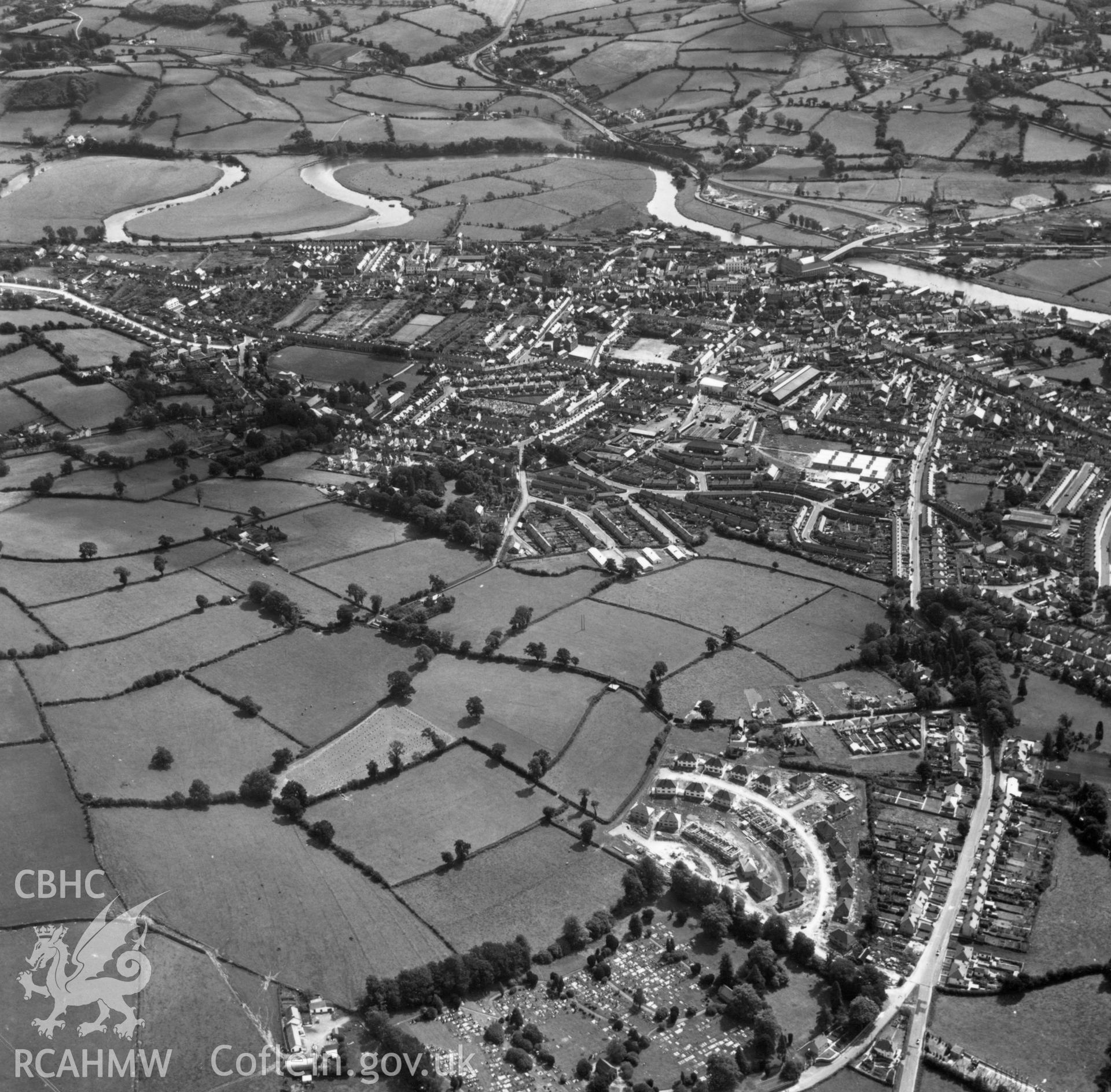 General view of Carmarthen, showing cemetery and new housing at Heol Rudd in the foreground. Oblique aerial photograph, 5?" cut roll film.