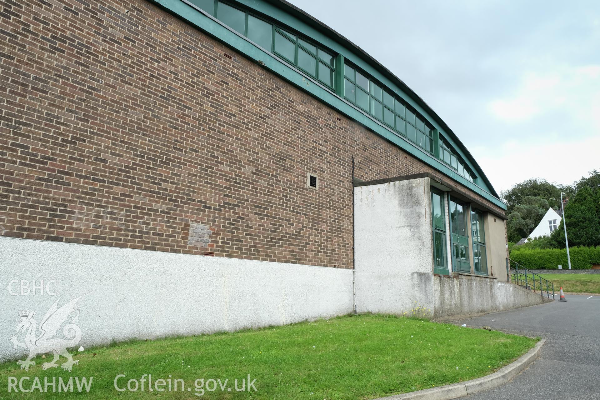 Digital colour photograph showing detailed exterior view from the side of entrance to Caernarfonshire Technical College, Ffriddoedd Road, Bangor. Photographed by Dilys Morgan, donated by Wyn Thomas of Grwp Llandrillo-Menai Further Education College, 2019.