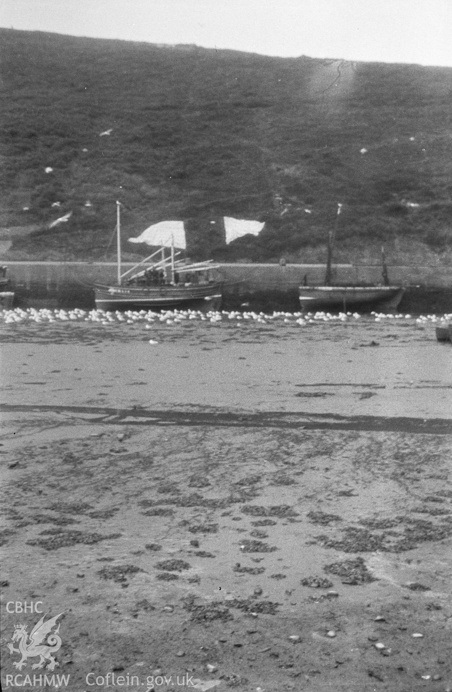Digital copy of a nitrate negative showing an unidentifed vessel off the coast of Aberystwyth, from the Peter Henley Collection.