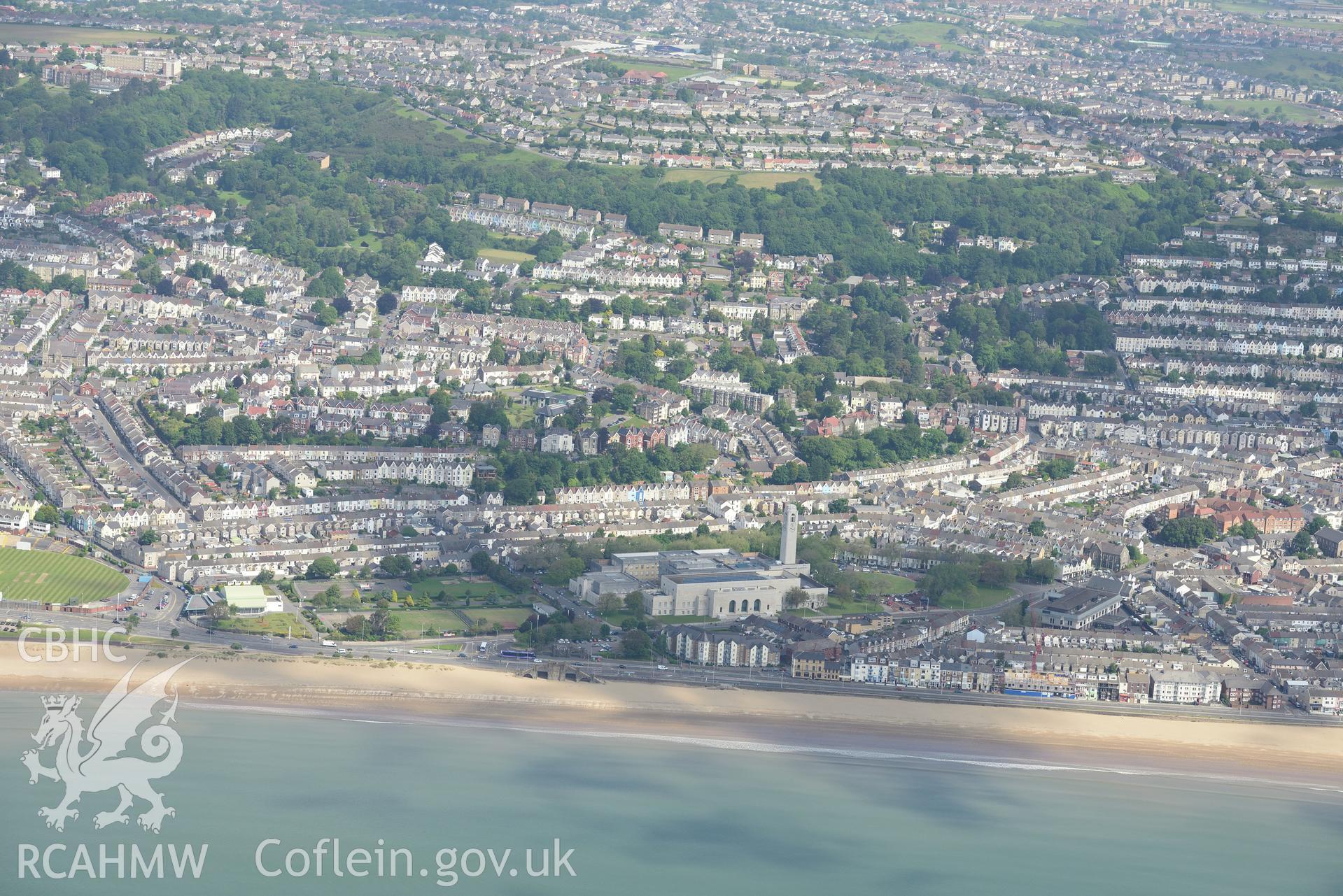 Guildhall, Victoria Park, Patti Pavilion and St. Helen's Cricket and Rugby Ground, taken from Swansea Bay. Oblique aerial photograph taken during the Royal Commission's programme of archaeological aerial reconnaissance by Toby Driver on 19th June 2015.