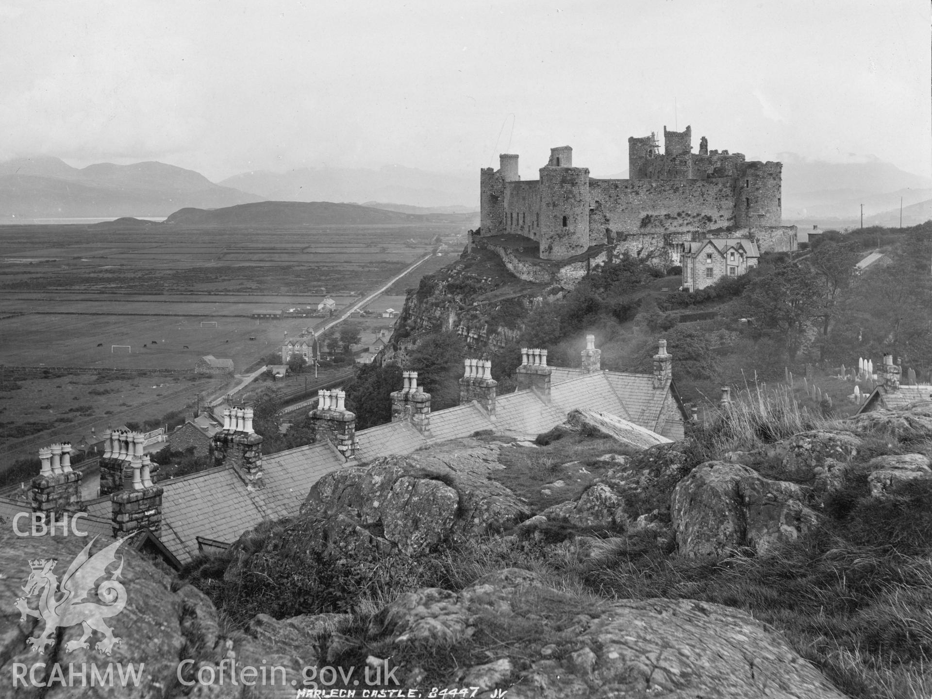 Digital copy of a black and white photograph relating to Harlech Castle: general view from south/ south-west.