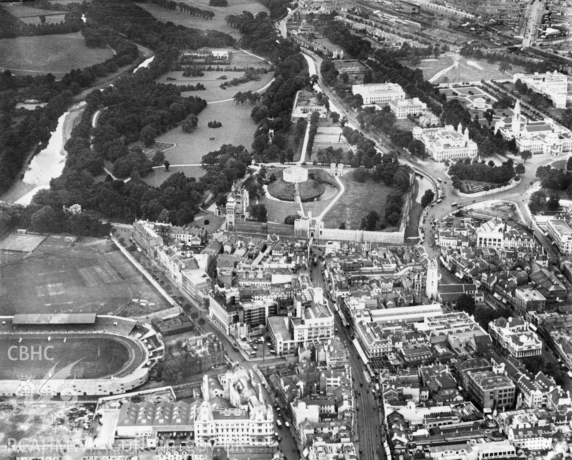 View of Cardiff showing castle, Bute Park and Cardiff Arms Park. Oblique aerial photograph, 5?x4? BW glass plate.