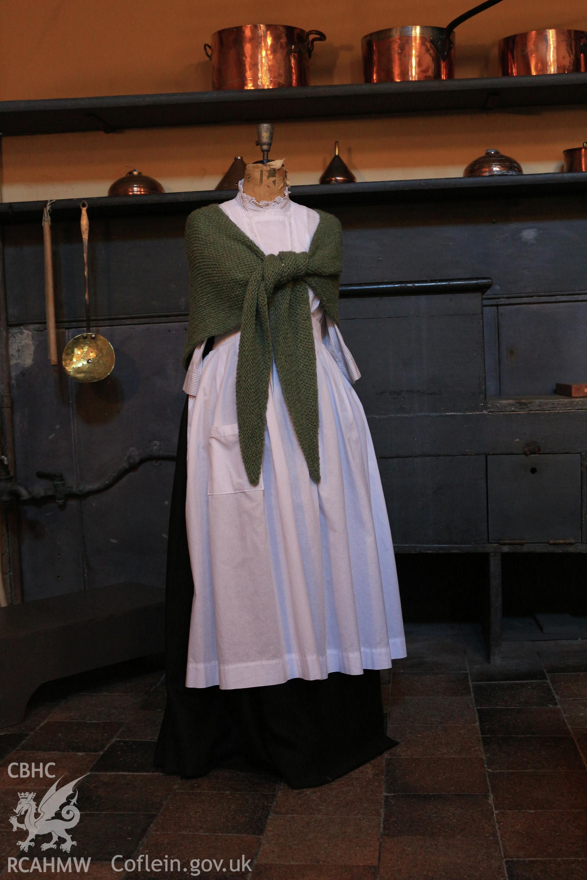Photographic survey of Penrhyn Castle, Bangor. Kitchens, display of a reconstruction of housekeeper's typical dress.