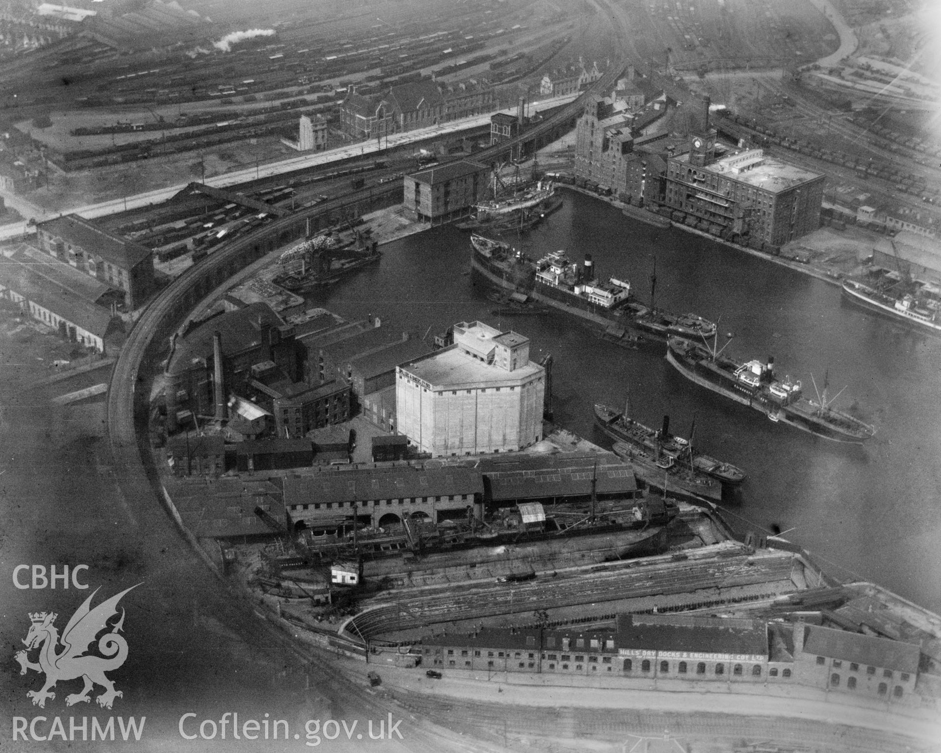 View of Cardiff West Bute Dock showing general view of Butetown, oblique aerial view. 5?x4? black and white glass plate negative.