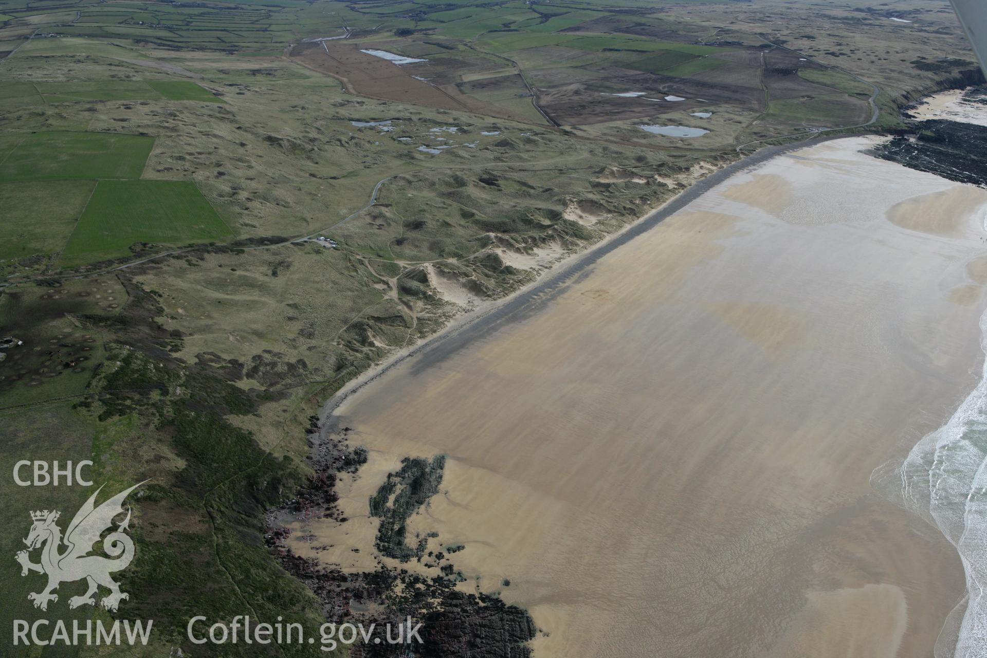 RCAHMW colour oblique aerial photograph of Freshwater West landscape. Taken on 02 March 2010 by Toby Driver