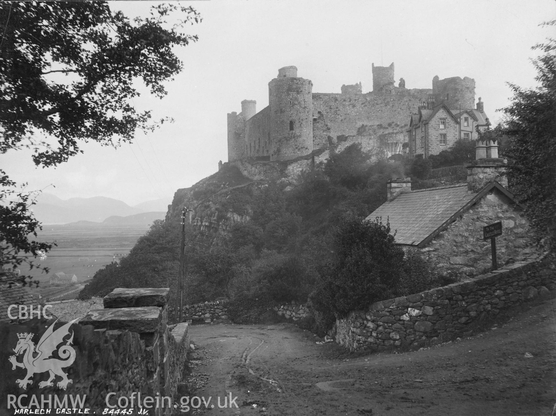 Digital copy of a black and white photographs relating to Harlech Castle: general view from north-west.