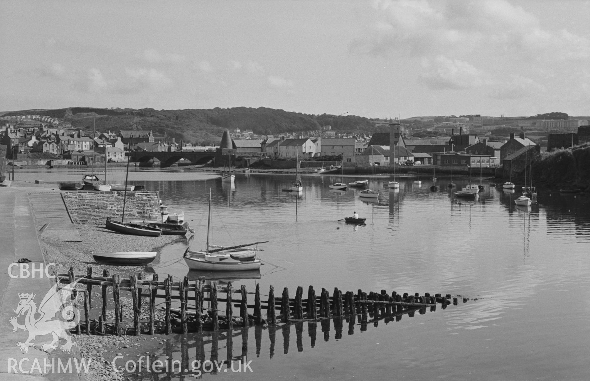 Digital copy of a black and white negative showing view looking across Aberystwyth harbour from the south end of the Promenade. Photographed by Arthur O. Chater on 25th August 1967 looking north east from Grid Reference SN 580 810.