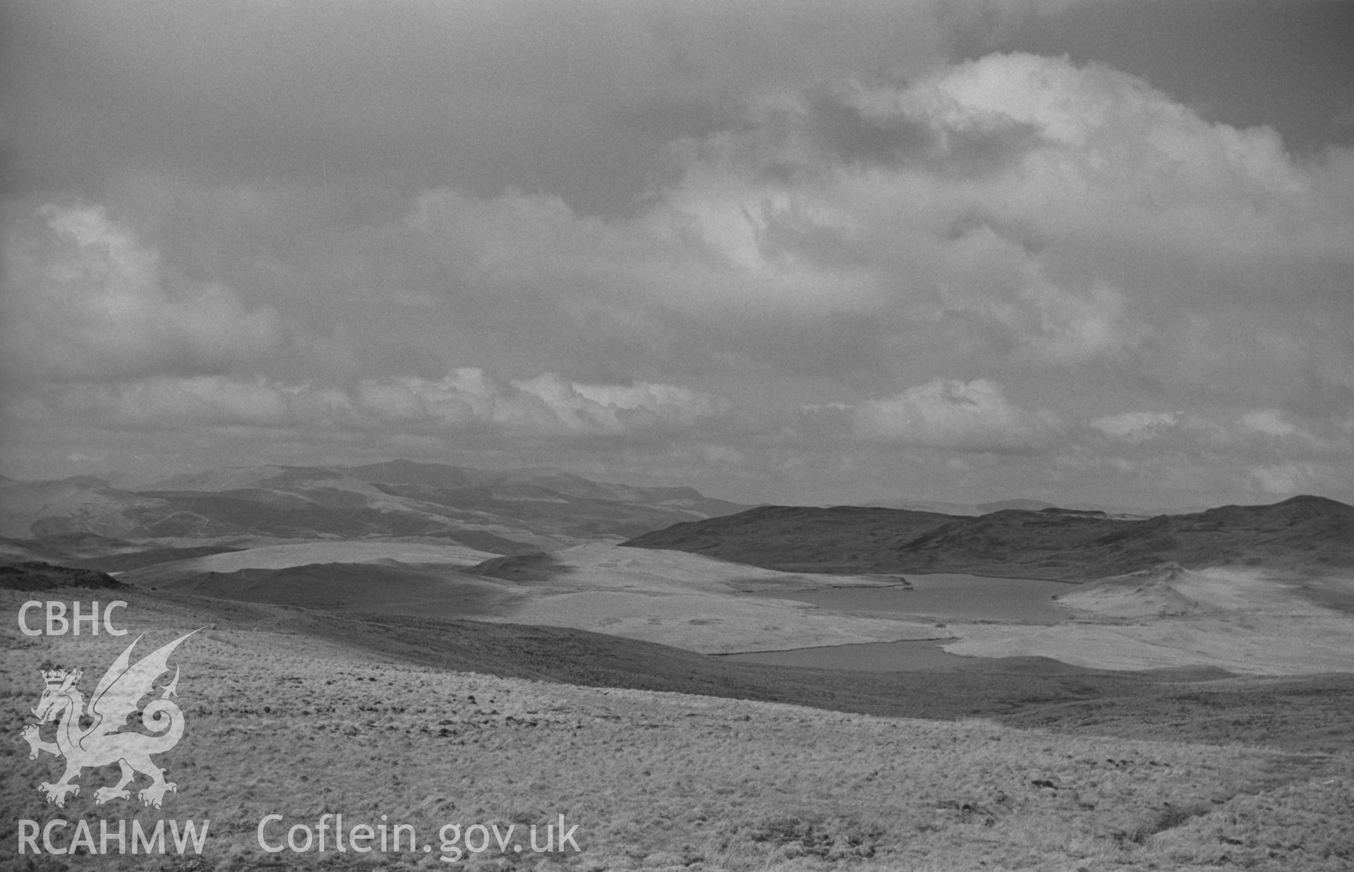 Black and White photograph showing New Pool and Anglers retreat from Bryn Melyn. Photographed by Arthur Chater in April 1962. Grid Reference: SN 741 922, looking east.