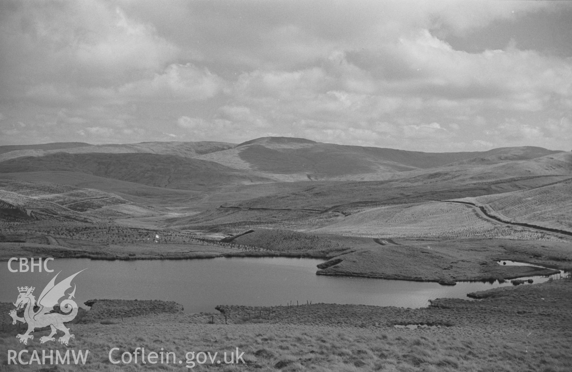 Black and White photograph showing Cadair Idris seen across Llyn Dwfn and Llyn Corach from Bryn Melyn, Angler's Retreat. Photographed by Arthur Chater in April 1962 from Grid Reference SN 739 920, looking north.