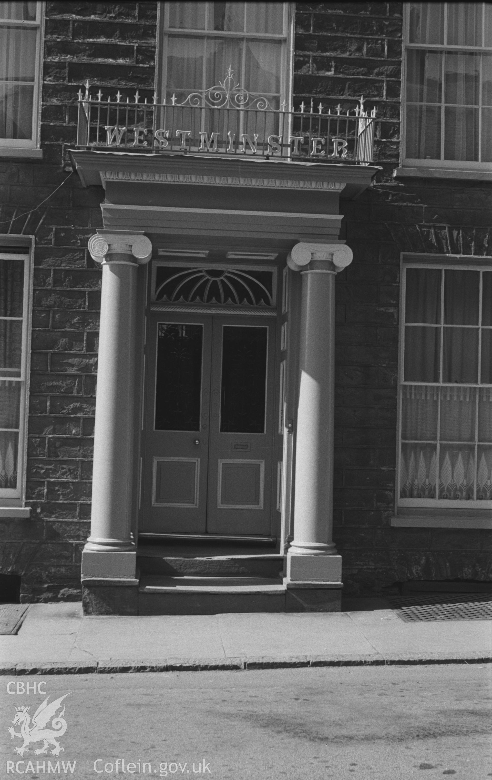 Black and White photograph showing doorway of Westminster House, Bridge Street, Aberystwyth. Photographed by Arthur Chater in March 1961, from grid reference SN 5825 8151, looking west south west.