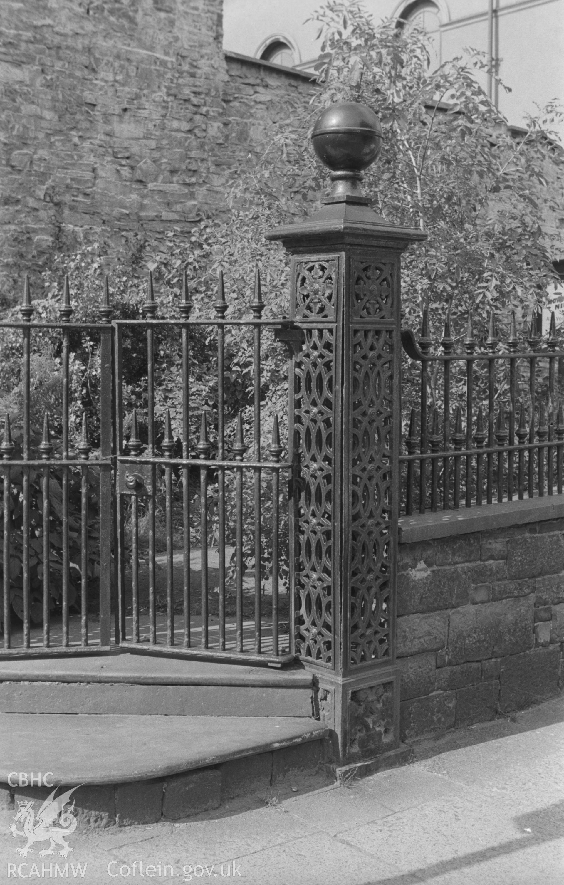 Digital copy of a black and white negative showing cast iron gatepost, railings and gate of Alfred Place Baptist Chapel, Aberystwyth. Photographed by Arthur O. Chater in September 1966 looking north west from Grid Reference SN 584 817. (Removed by 1978.)