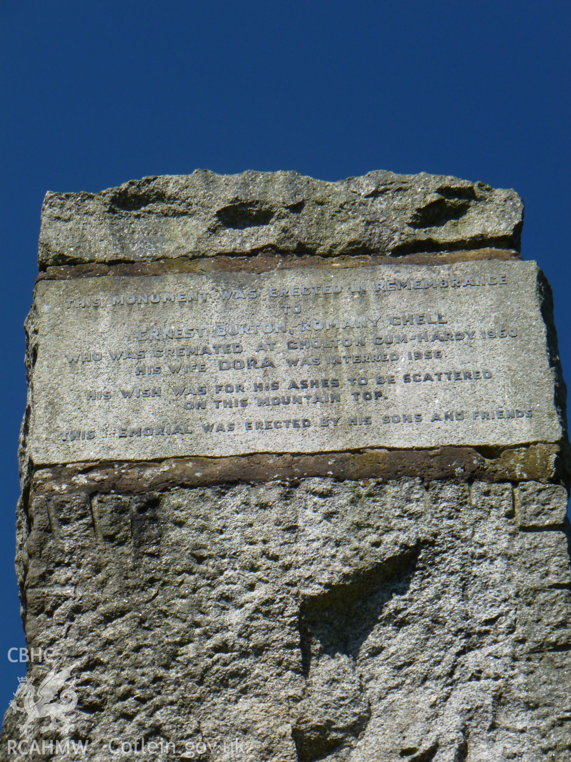 Photograph of the Romany monument showing the inscription to Ernest Burton, Romany Chell, on the west side.