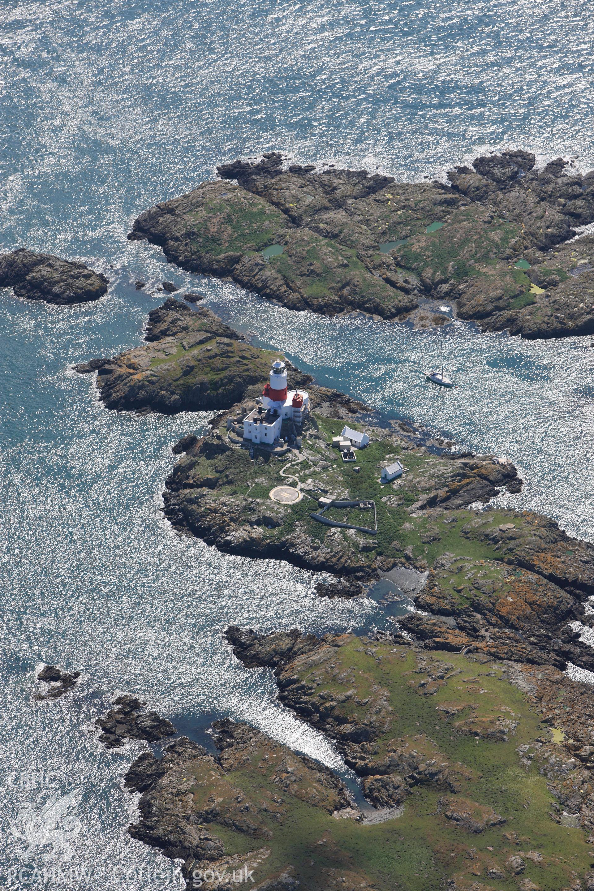 RCAHMW colour oblique photograph of Skerries Lighthouse, The Skerries. Image used, in 'Historic Wales from the Air' (RCAHMW 2012). Figure 170. Taken by Toby Driver on 20/07/2011.