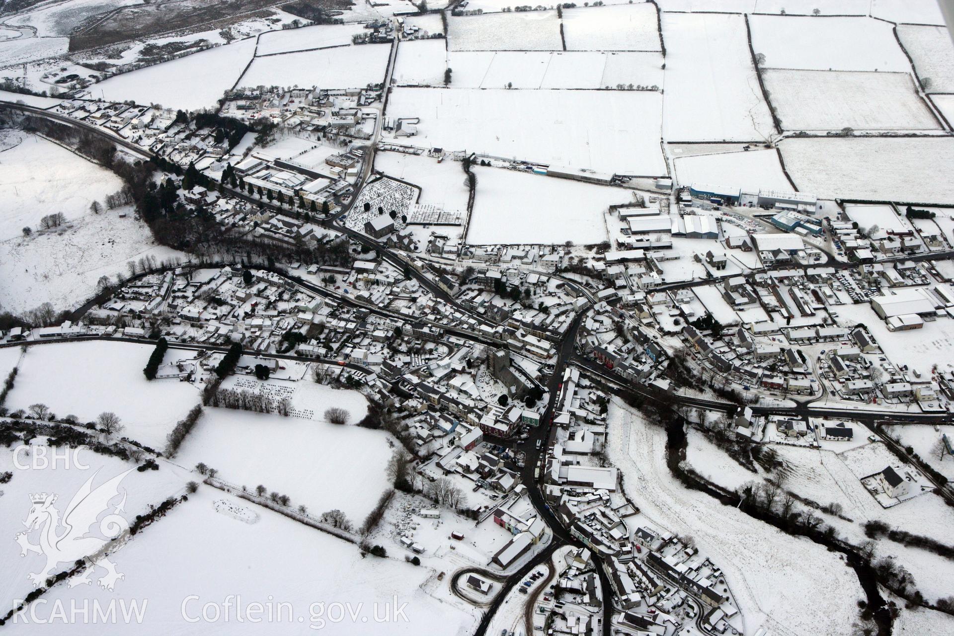 RCAHMW colour oblique aerial photograph of Tregaron under snow, by Toby Driver, 02/12/2010.