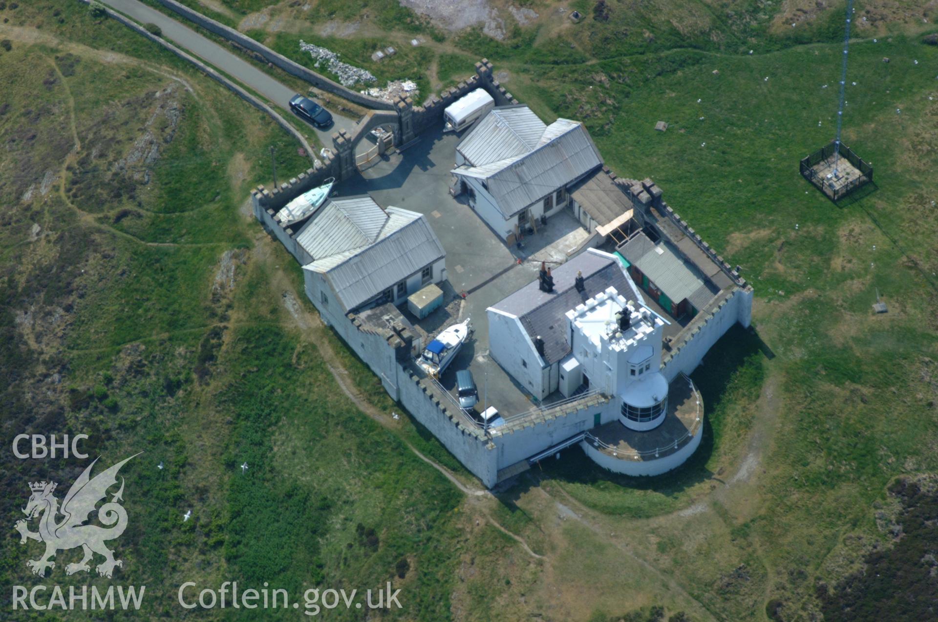 RCAHMW colour oblique aerial photograph of Elianus Point Lighthouse, Llaneilian taken on 26/05/2004 by Toby Driver