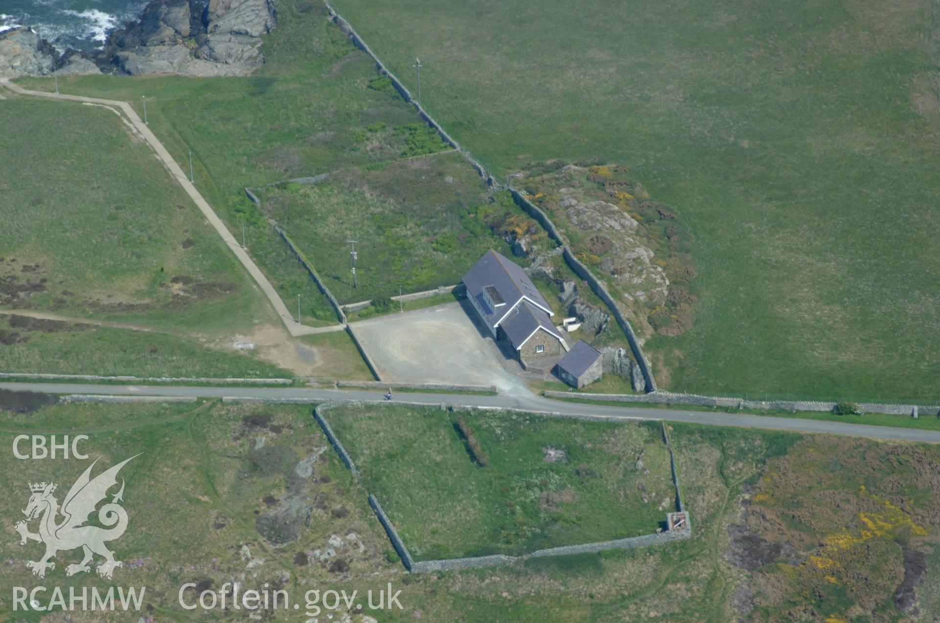 RCAHMW colour oblique aerial photograph of Elianus Point Lighthouse, Llaneilian taken on 26/05/2004 by Toby Driver