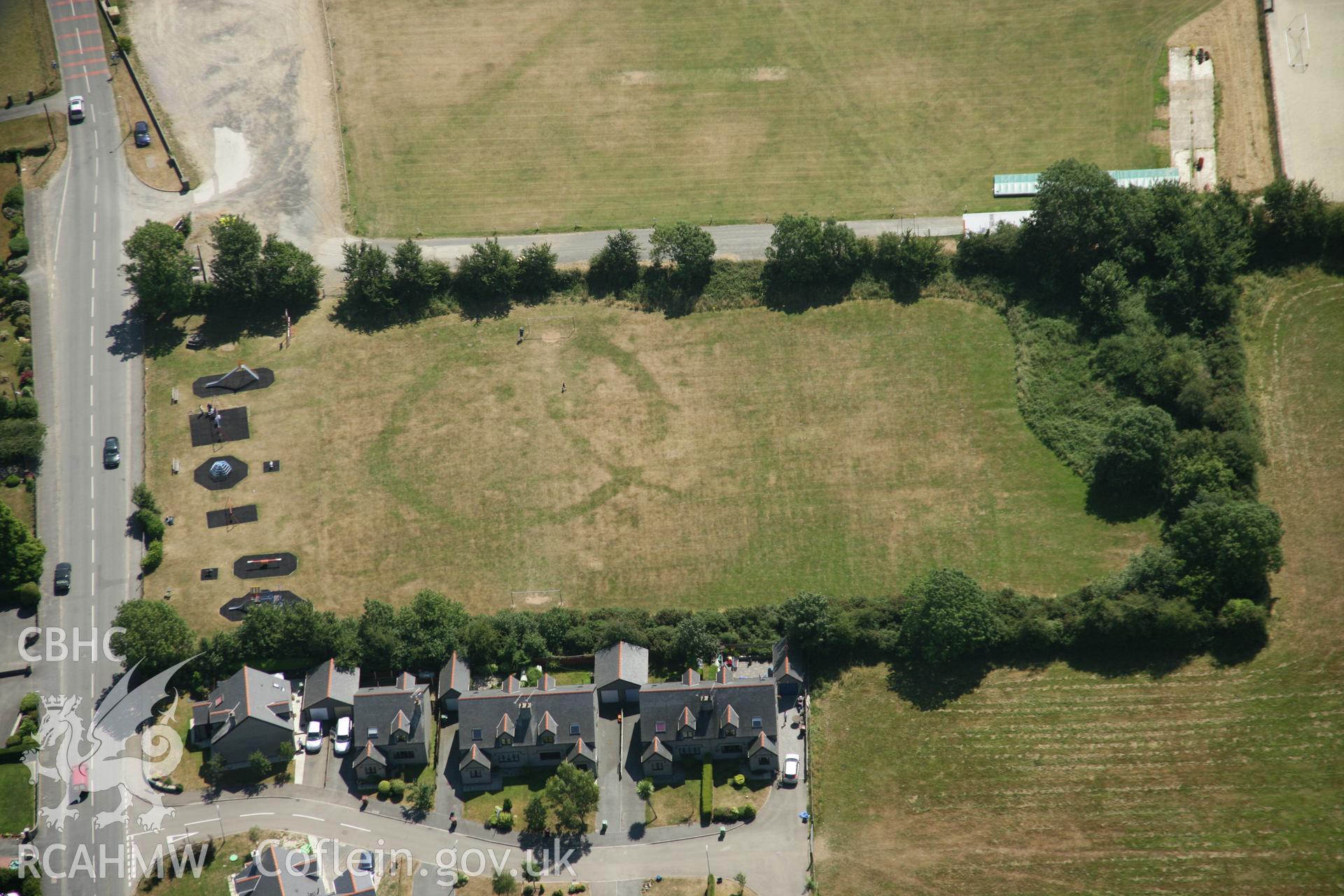 RCAHMW colour oblique aerial photograph of King George's Field Enclosure, viewed from the north-west. Taken on 03 August 2006 by Toby Driver