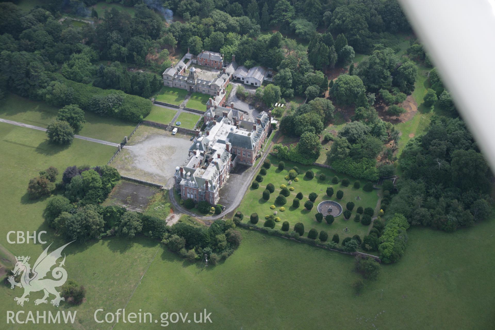 RCAHMW colour oblique aerial photograph of Kinmel Hall and Park (Clarendon School), Bodelwyddan. Taken on 14 August 2006 by Toby Driver.