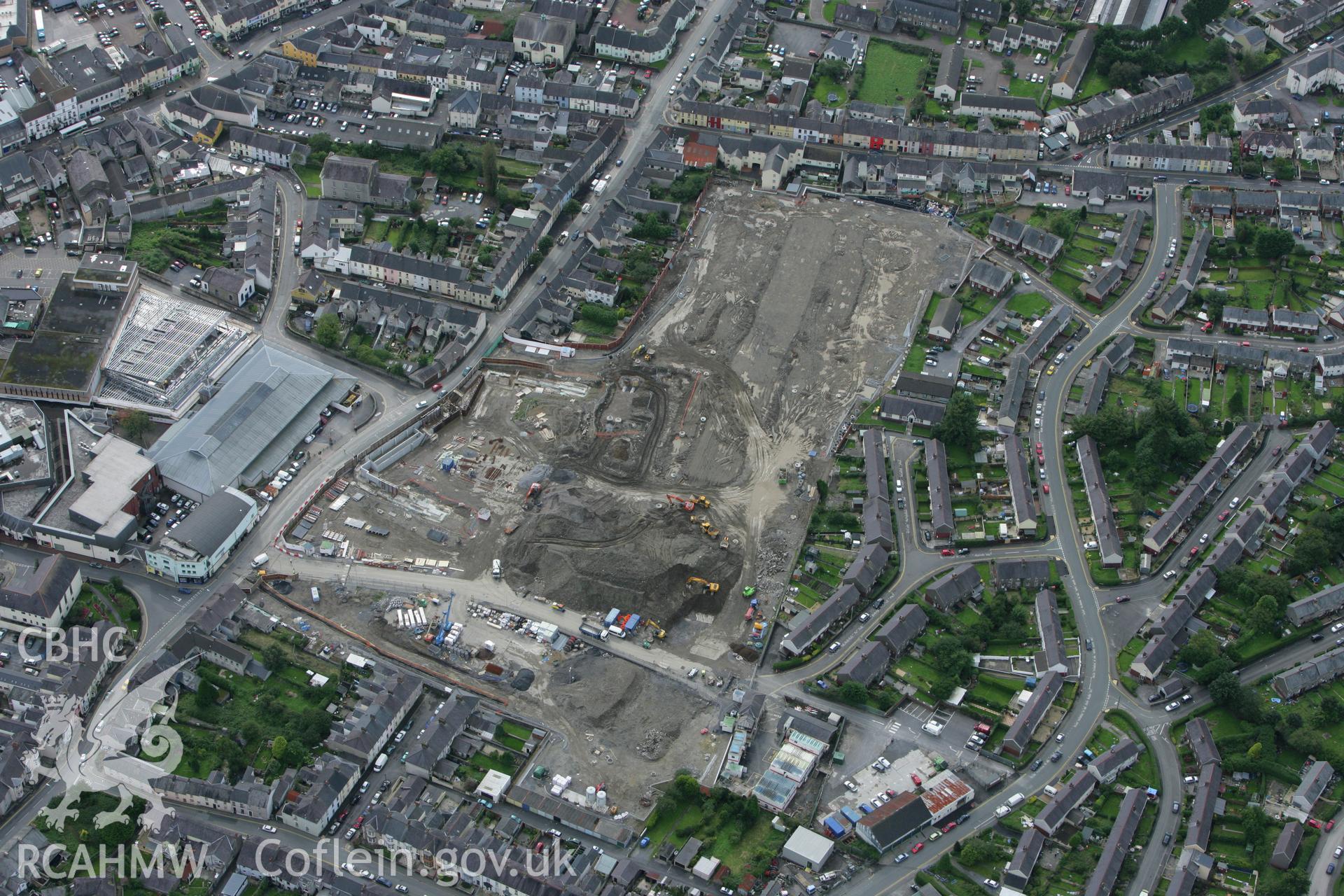 RCAHMW colour oblique photograph of Carmarthen Old Provision Market, with development works for the St Catherine Shopping Centre. Taken by Toby Driver on 12/09/2008.
