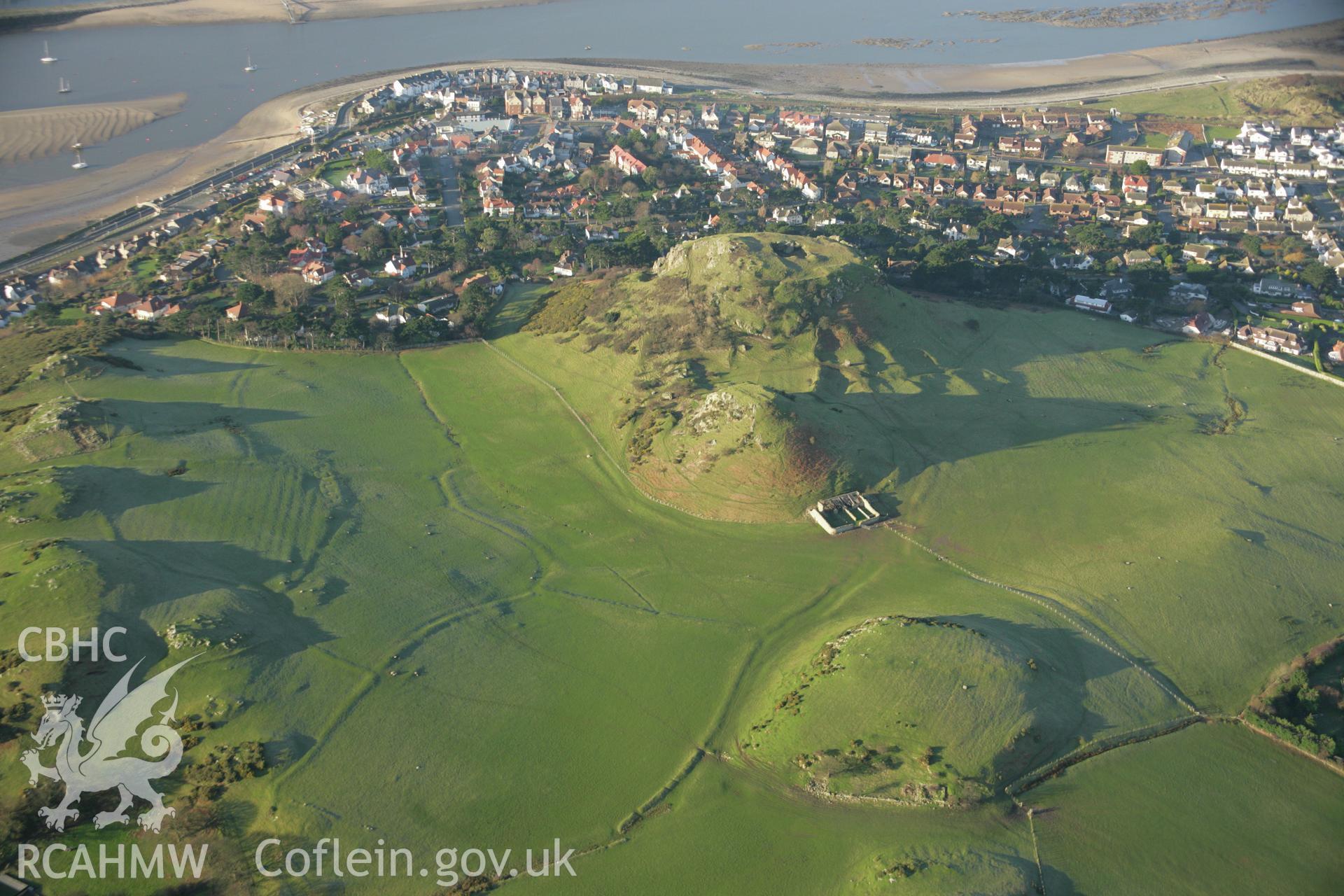RCAHMW colour oblique aerial photograph of Deganwy Castle and of earthworks of settlement features north-east of the Castle. Taken on 25 January 2007 by Toby Driver