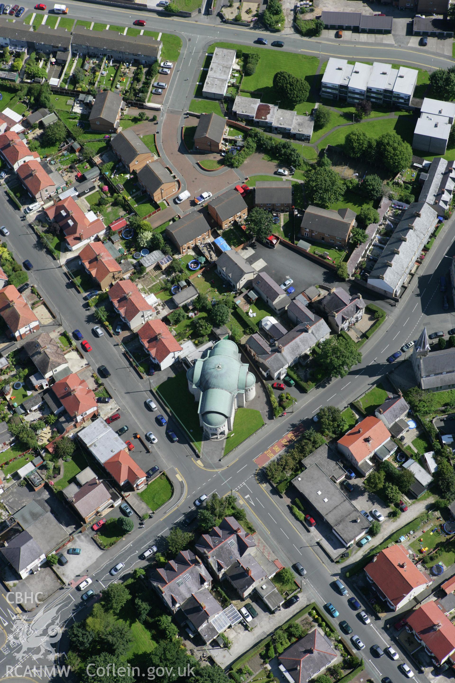 RCAHMW colour oblique aerial photograph of Abergele with the Catholic church visible. Taken on 31 July 2007 by Toby Driver