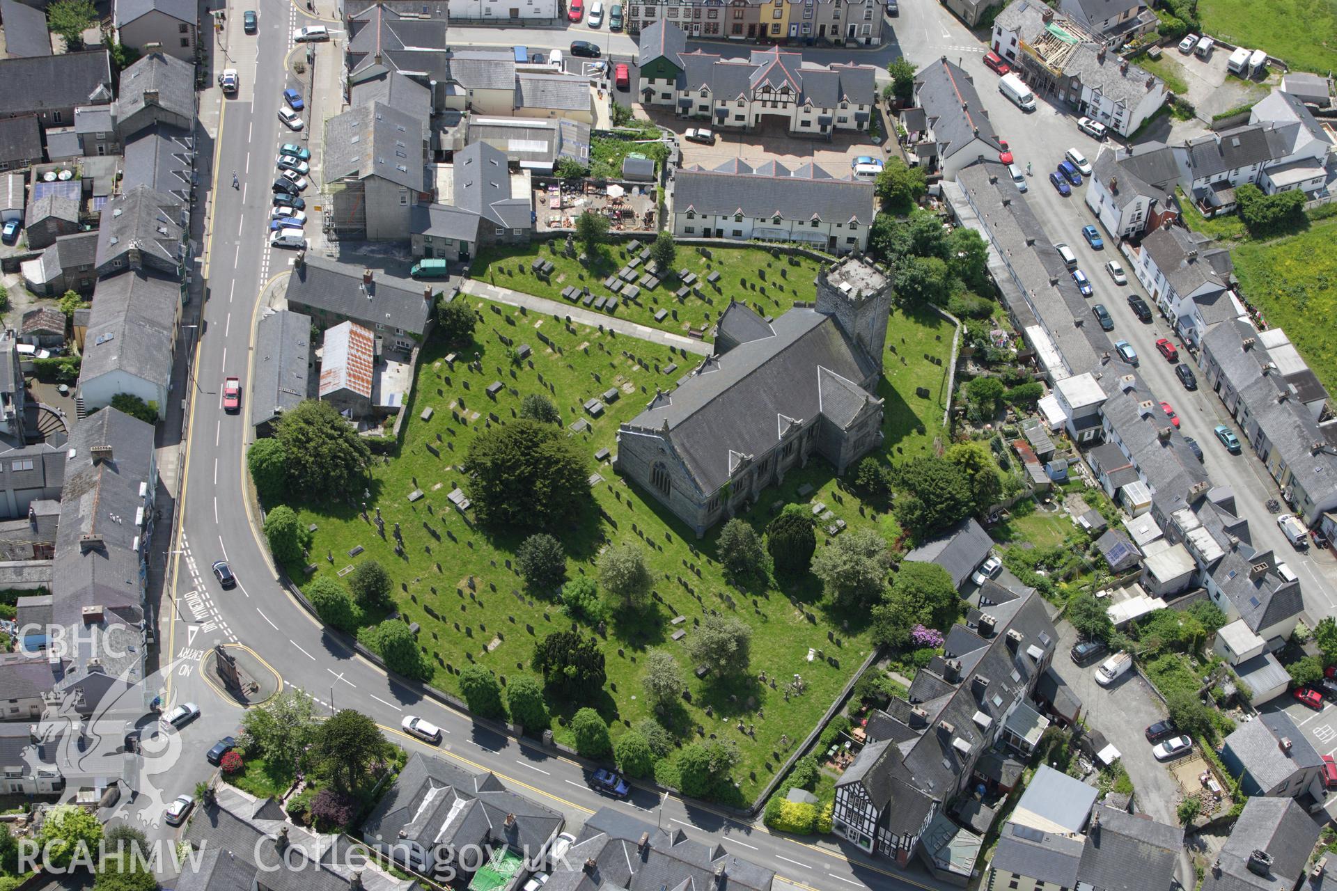 RCAHMW colour oblique aerial photograph of St Peter's Church, Heol Penrallt and Doll Street, Machynlleth. Taken on 02 June 2009 by Toby Driver