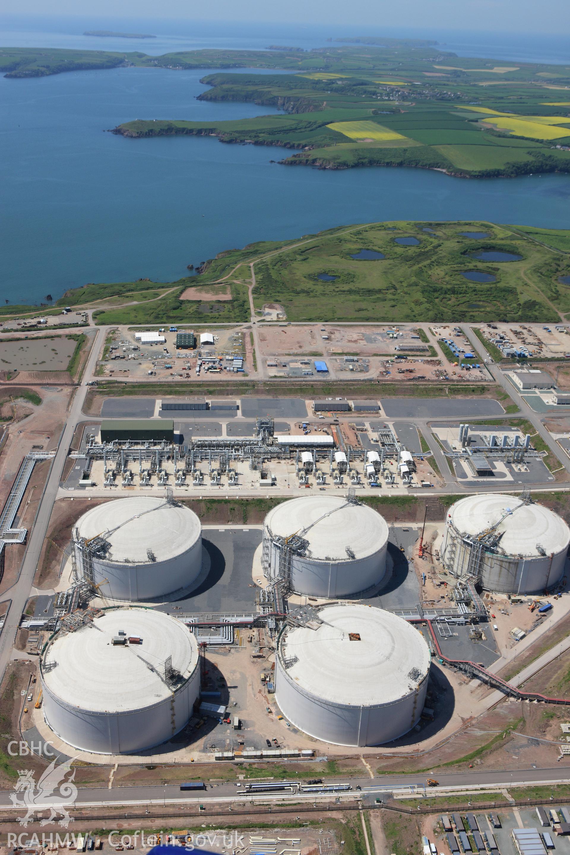 RCAHMW colour oblique aerial photograph of Esso South Hook Oil Refinery and liquid natural gas facility, Milford Haven. Taken on 01 June 2009 by Toby Driver