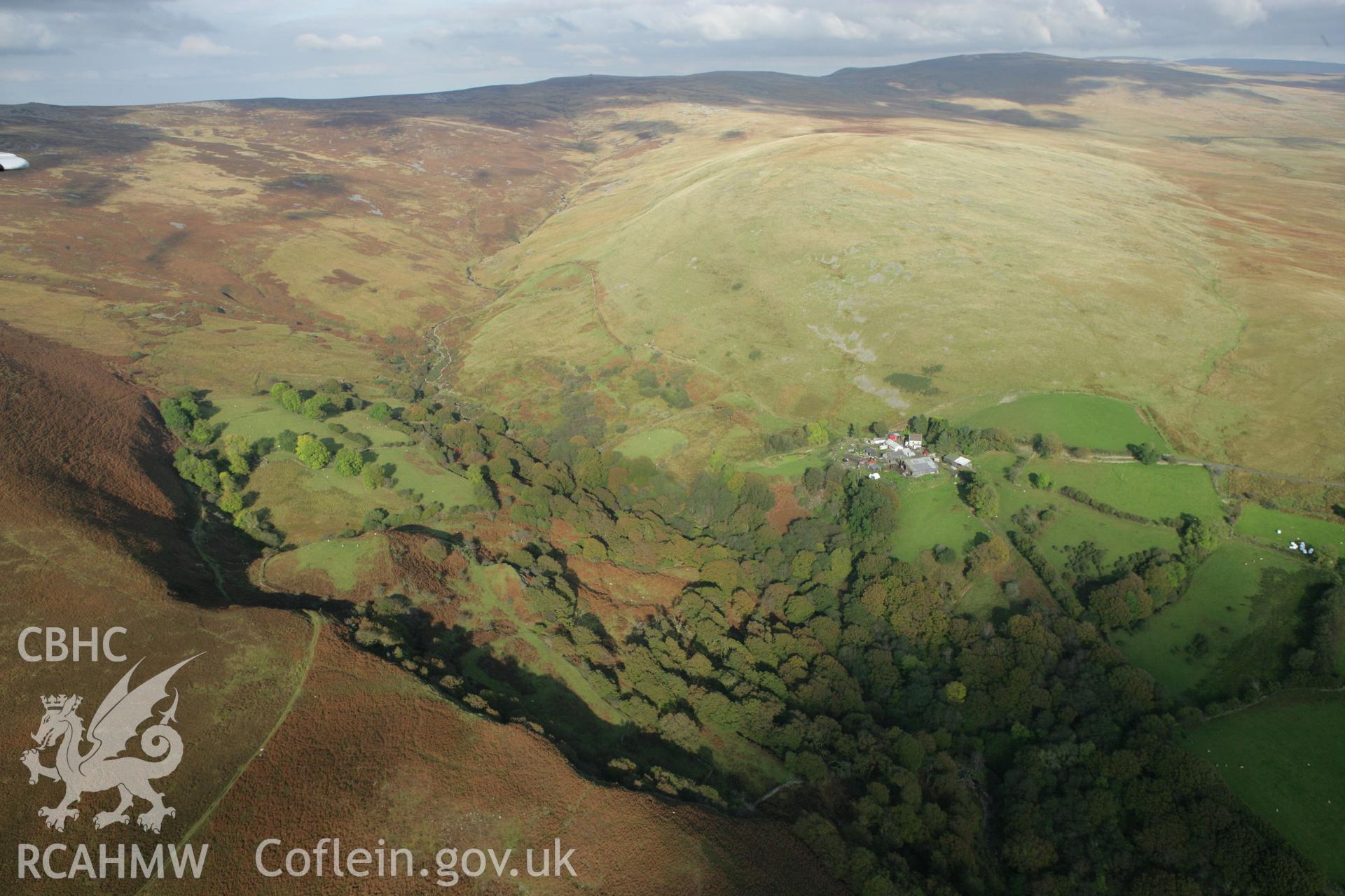RCAHMW colour oblique aerial photograph of Pantyffynnon Valley Enclosures. Taken on 14 October 2009 by Toby Driver